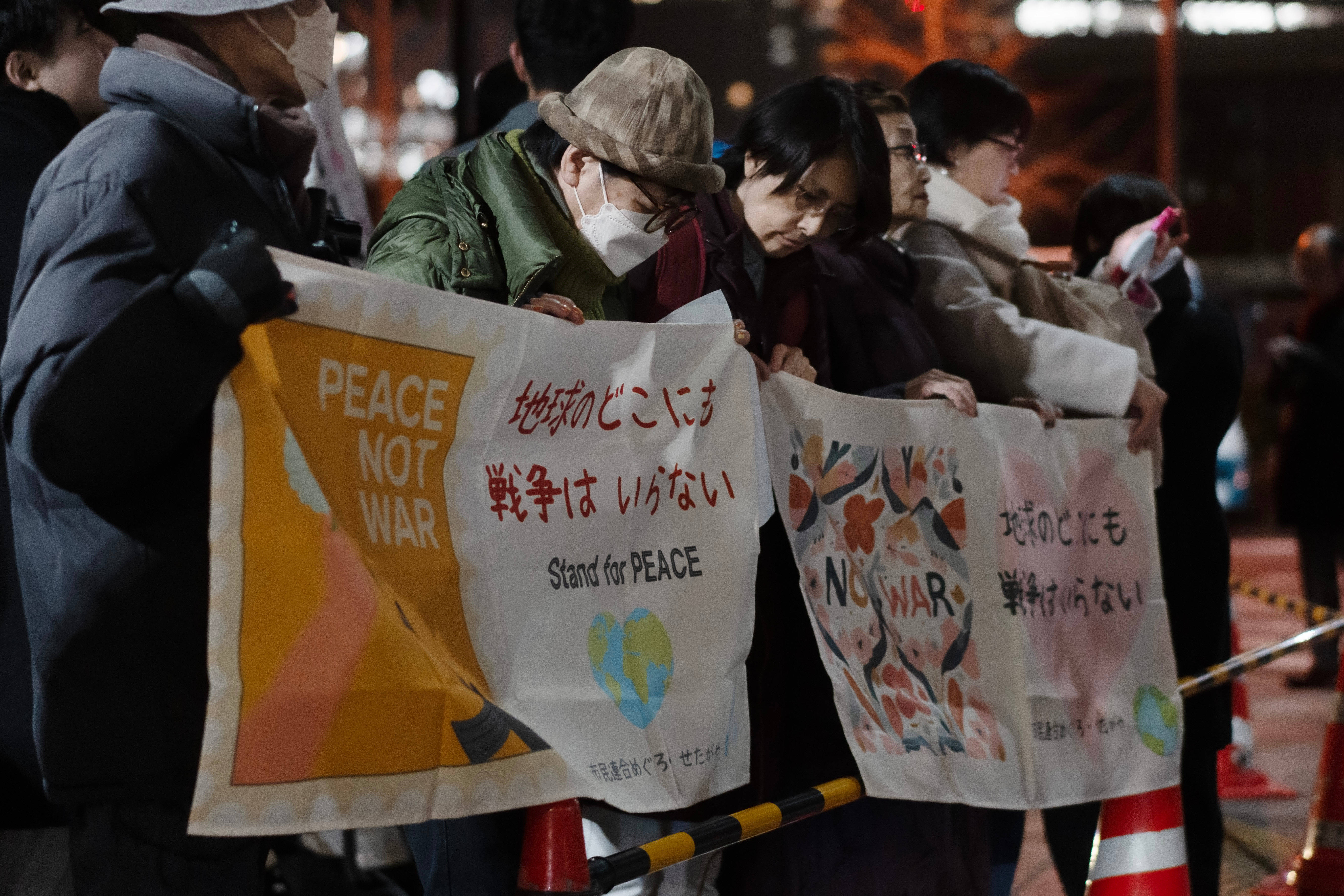 信用网怎么开户_日本民众抗议高市对美军事打击委内瑞拉“失声”